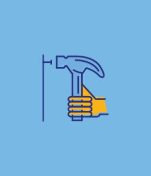 Hand holding a hammer