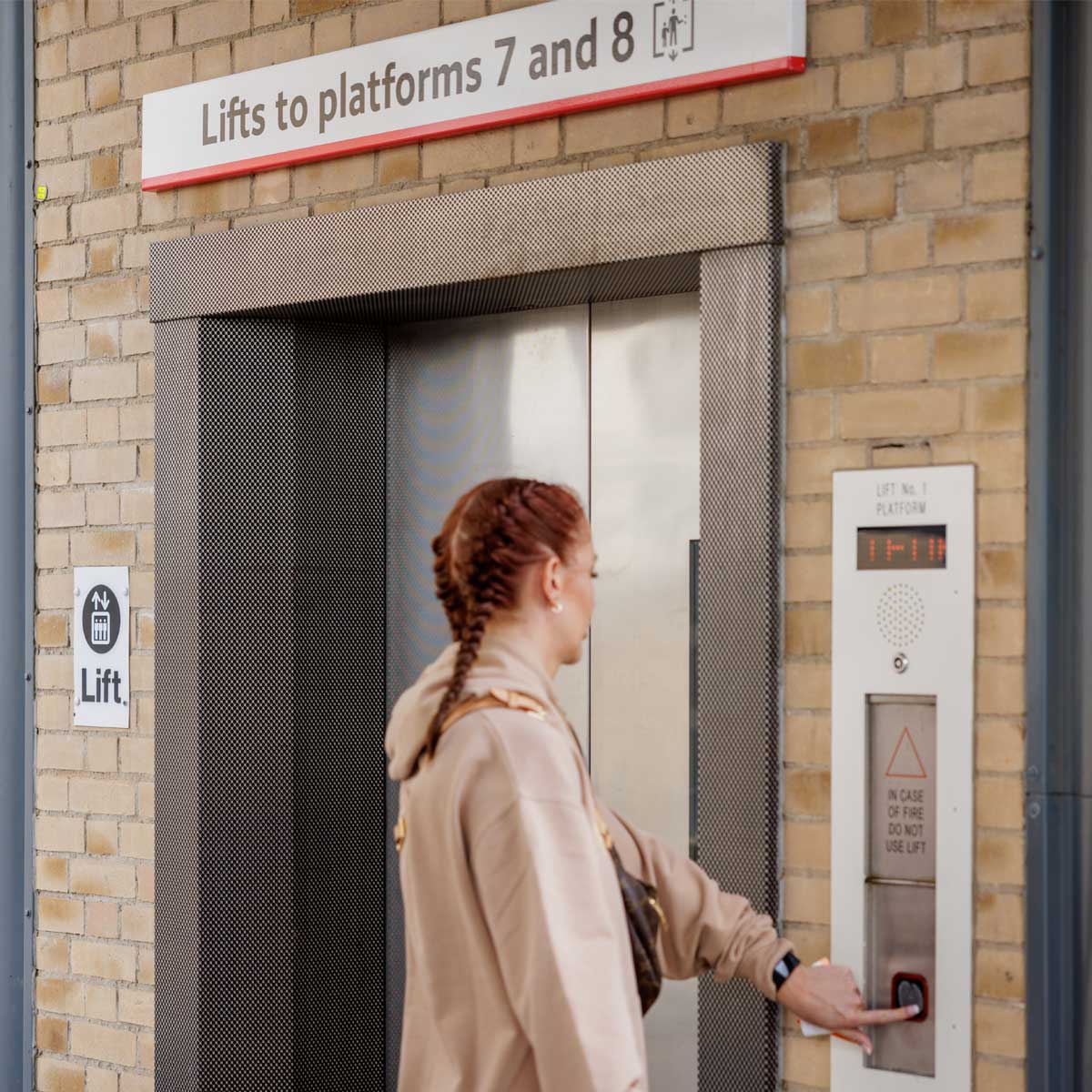 Woman waiting for a lift